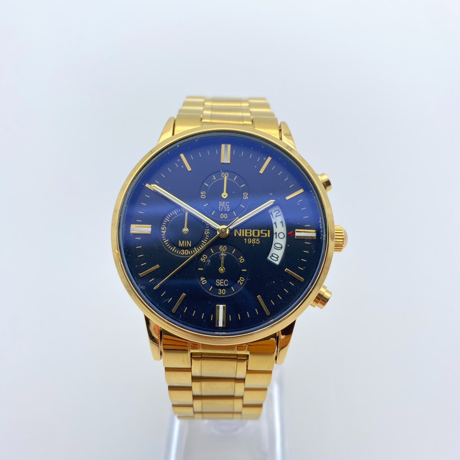 Montre chronographe à quartz 43 mm en acier doré et cadran noir
