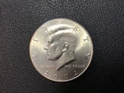 2002-D Kennedy Half Dollar. BU Condition. Has Die Crack runningon bottom of Neck