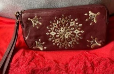Lucky Brand Red Leather wallet Wristlet. Has A Yellow Star Shape On Front Very P