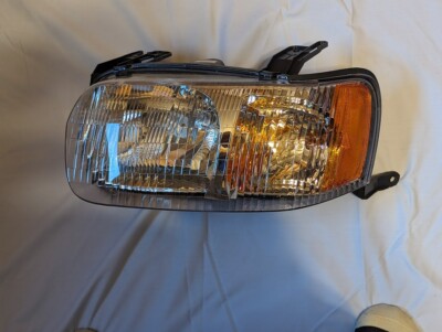 Brand New Driver Side Headlite $59.99 for Ford 2001 to 2004 Escape+ 19 models