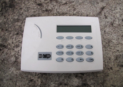 DMP 7060A-W Fire / Security Alarm Thinline Aqualite LCD Keypad White Used