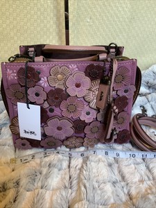 coach rogue 25 tea rose