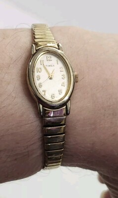 VTG Oval TIMEX GOLDTONE Ladies Stretch Band Watch White Face  display picture 3