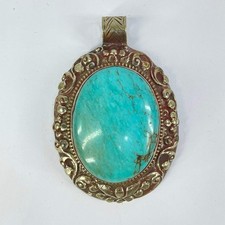 Tibetan Turquiose Pendant Silver Repoussé
