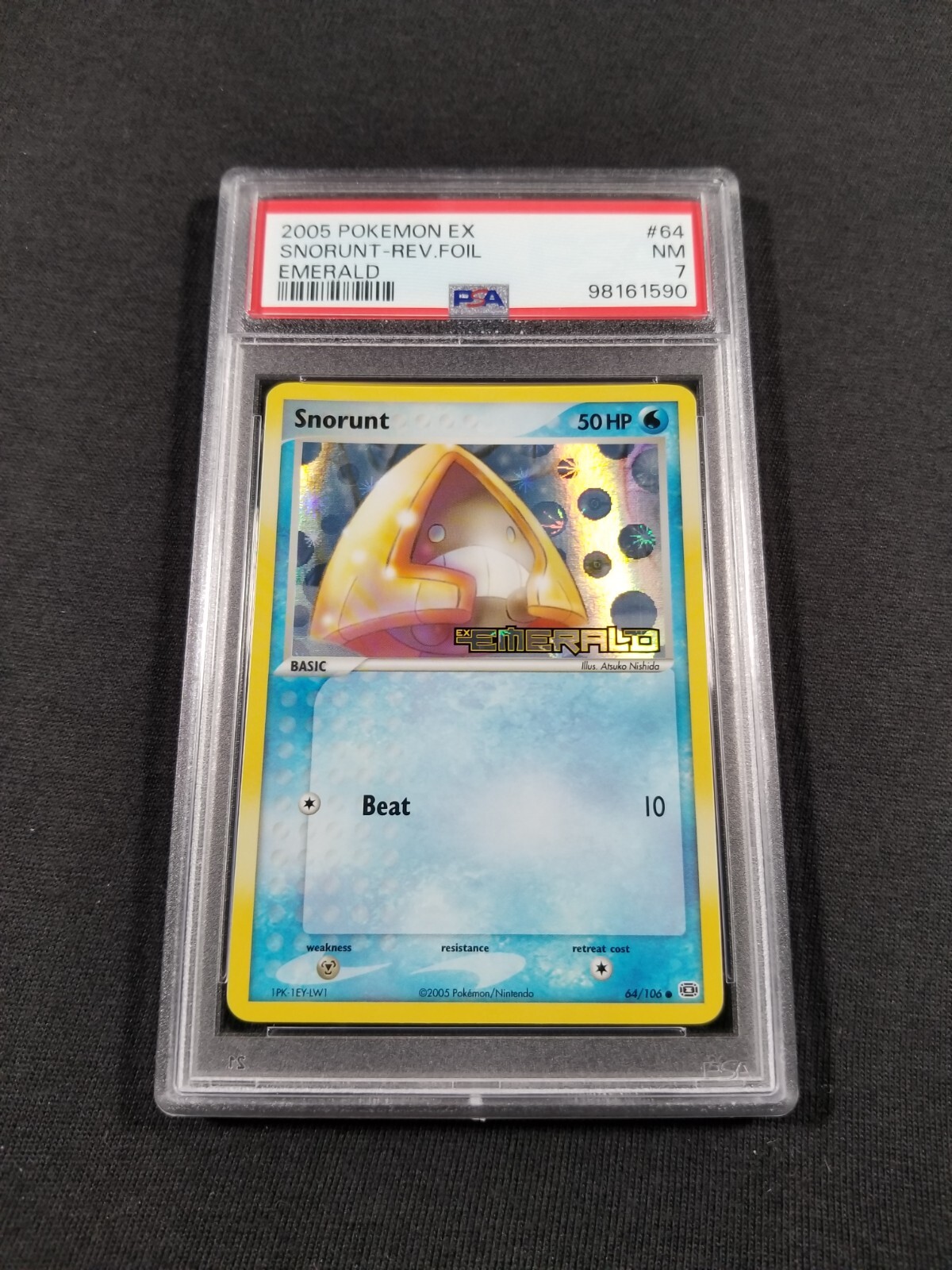 Pokemon Card Reverse Holo Snorunt 64/106 PSA 7 NM ex Emerald