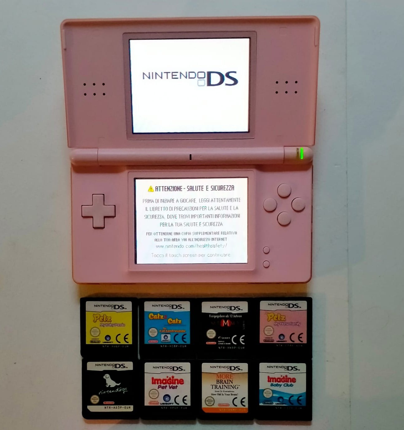 Nintendo DS Lite Rosa Console + 8 Cartucce Originali - Testato e Funzionante