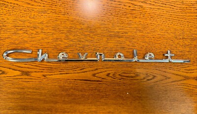Chevy Script 1957 Chevy NOS Chrome