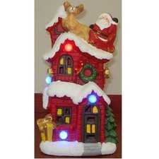 Lighted Christmas House with Santa Claus Figurine 10 x 5.5 x 4 Inch New