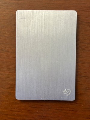 Seagate Backup Plus Slim Silver 2TB External (SRD00F1 ) Hard Drive-Pre-owned