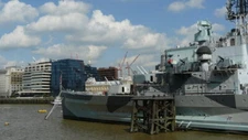 Photo 6x4 HMS Belfast London Close-up of the ship, showing some of the gu c2009