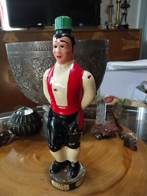 Rare vintage Alado man shaped wine bottle Cleveland OH.