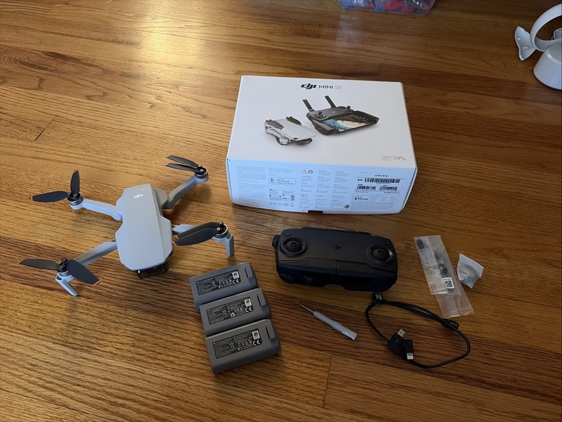 DJI Mini SE Drone w/ Controller, 3 Batteries, and Original Box