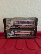 Maisto Transport Hauler 18 Wheeler Lot Of (2) White 1 U-HAUL & 1 GATOR FORD