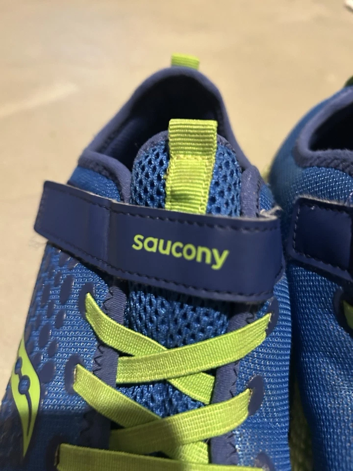 Zapatos para correr Saucony Cohesion para niños Foto 2 de 4