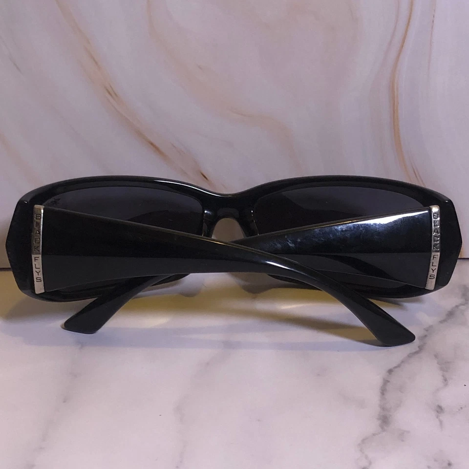 Gafas de sol negras Flys para hombre envolventes tonos deportivos marco negro modelo joven Foto 2 de 4