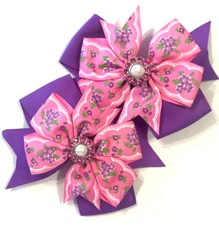 Beautiful Flowers with a faux diamond center inspired pigtail bows for girls.