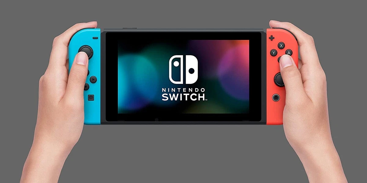 Nintendo Switch – OLED Model w/Neon Red & Neon Blue Joy-Con (Renewed)