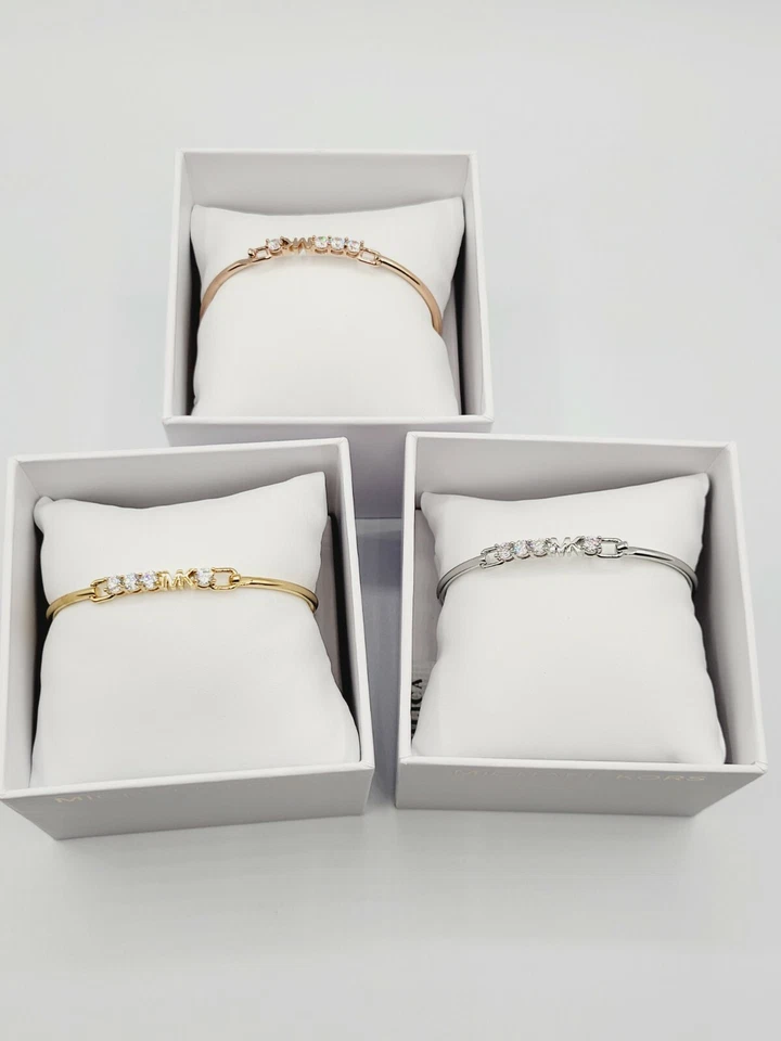 Brazalete Brazalete Michael Kors Oro/Plata/Oro Rosa Logo Pavimentado Bisagra Precio de venta sugerido por el fabricante $150 Foto 2 de 3