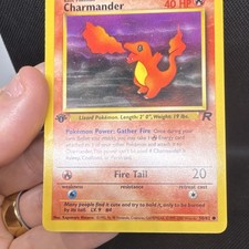 1995 charmander pokemon card value 50/82 Charmander Team Rocket 1st Edition 50/82 PSA 10 – TBC Games main image 0