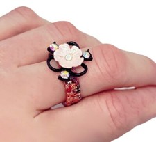 Beautiful handmade  one of a kind resin ring with flower charm. US size 9.5