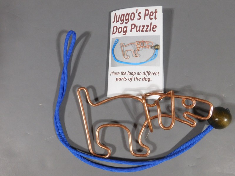 Juggo's Pet Dog Puzzle & instruction booklet. Copper Wire Maze w/Loop & Bead