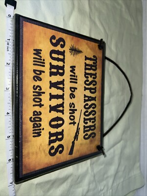 Trespassers Will Be Shot, Survivors Will Be Shot Again, Wooden Sign