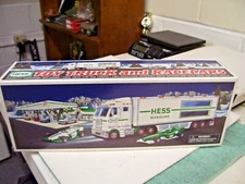 HESS 2003 TOY TRUCK AND RACECARS  NEW IN BOX