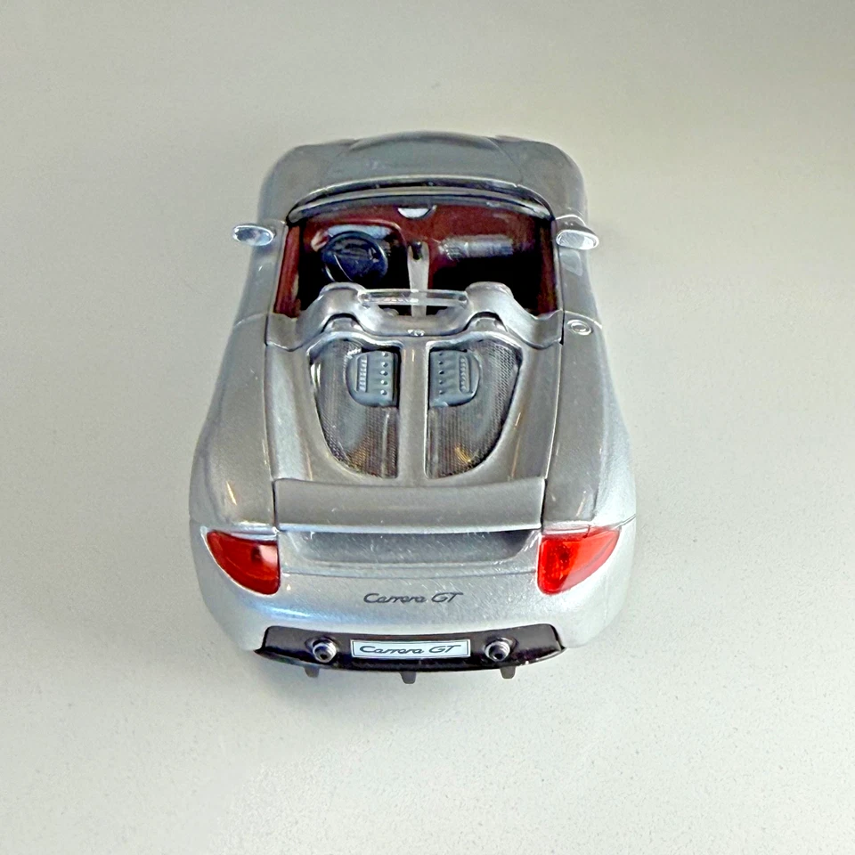 ALTA VELOCIDAD 1:43 Porsche Carrera GT - Plateado Metálico, Die-Cast, LIMPIO Foto 3 de 4