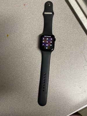 Apple Watch SE 44mm Space Gray Aluminum Case with Black Sport Band - Regular...