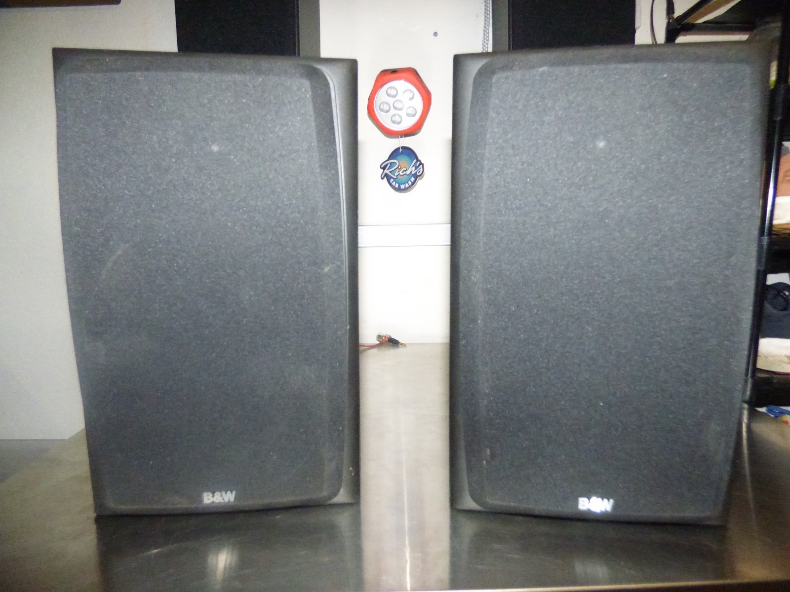 B&W DM 303 bookshelf speakers. In good cosmetic condition and are fully working