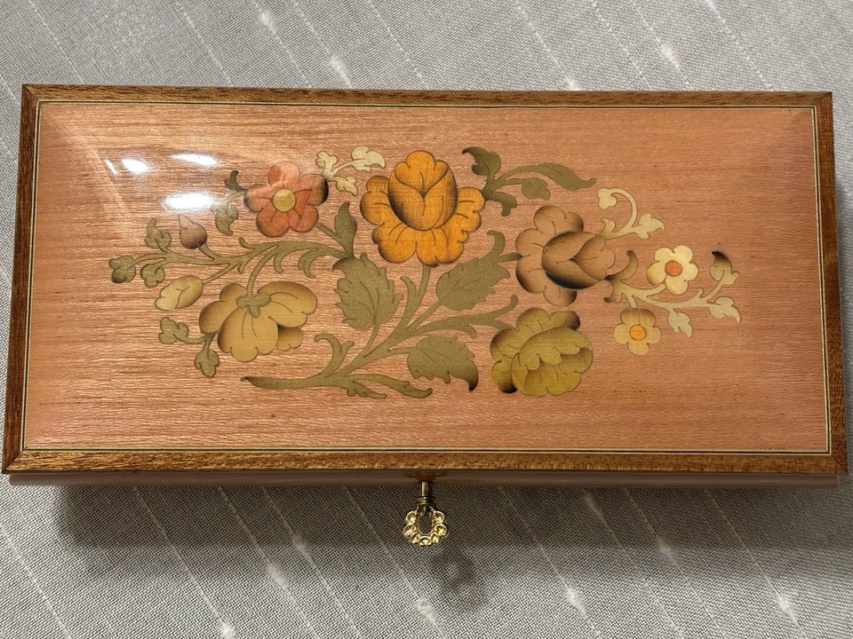 Wood-inlaid Italian music box by Ben Rickert — marquetry craftsmanship that's a step above typical gift-shop fare.