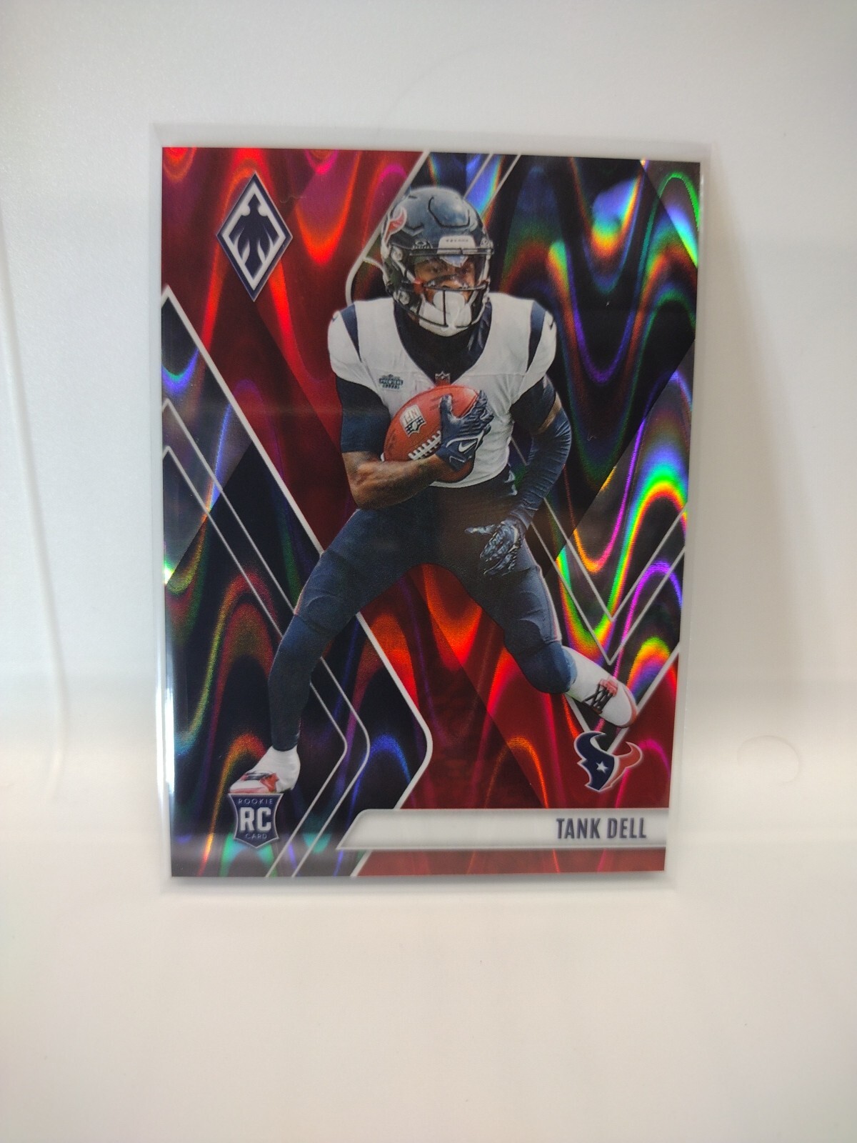 🏈#d /199 2023 Panini Phoenix - Rookies Red Seismic #135 Tank Dell RC SP Houston