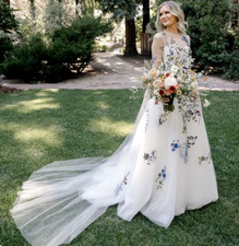 Fantasy Long Sleeves O-Neck Floral Lace A-line Wedding Dress Sweep Train