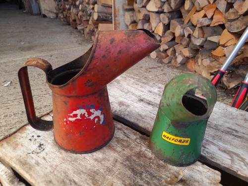 Two vintage oil jugs, 1/2 pint & pint, both well used , Halfords & Esso