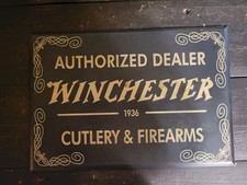 Vintage Winchester Firearms Cutlery Dealer 1936 Tin Over Cardboard Sign Gas Oil