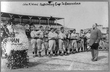 John Montgomery Ward presenting cup to Roger Bresnahan,New York NL players,1909