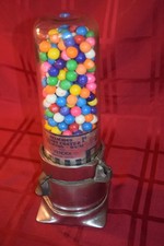 1920's vintage gumball vending machine works with a key