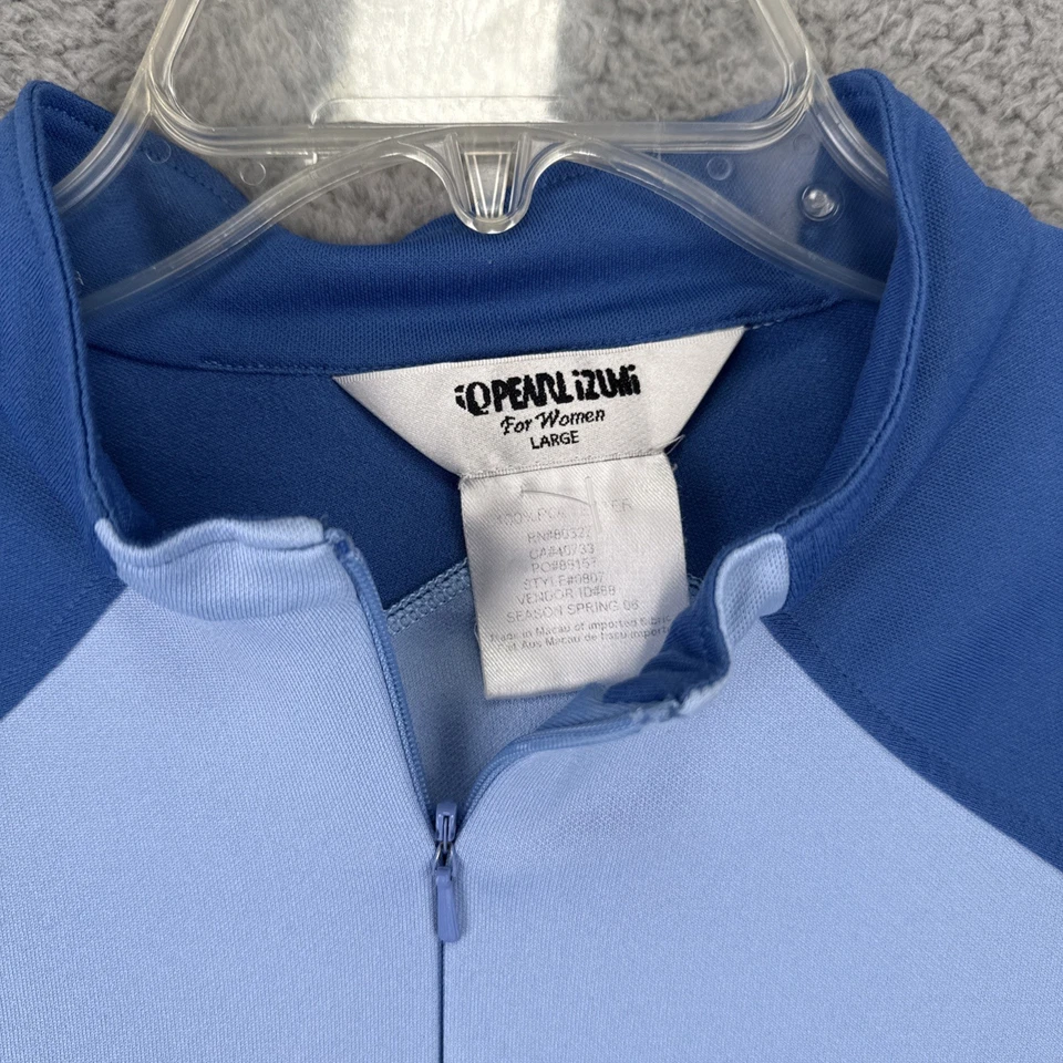 Camisa de ciclismo feminina Pearl Izumi grande S/S bolsos aquáticos 1/4 zíper - Imagem 2 de 4