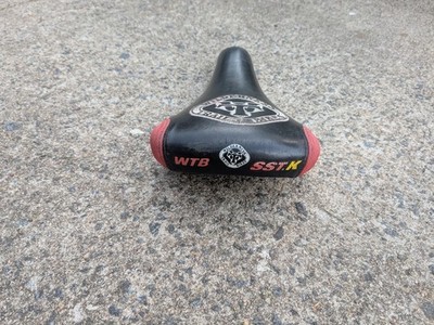 Vintage WTB SST.K Saddle Black Red Titanium Rails Wilderness Trail