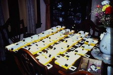 1990s Table Covered with Boxes of Slides Film Projector Collection 35mm Slide