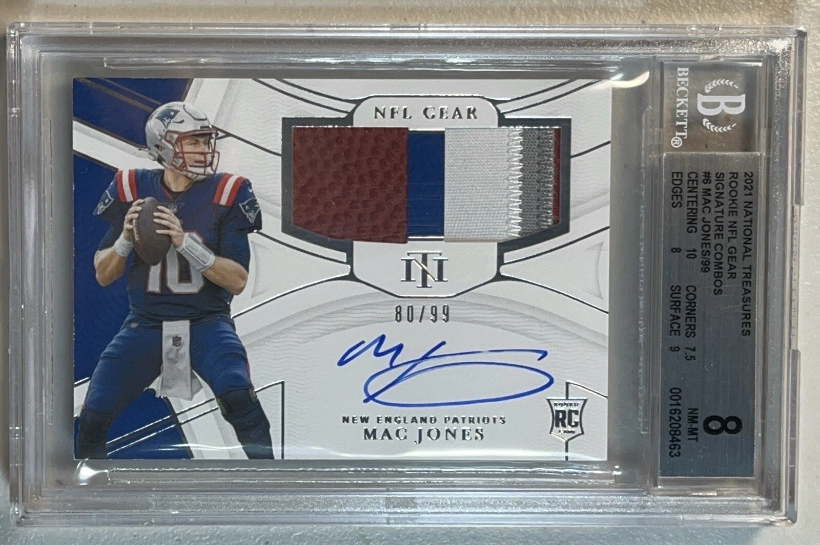 Mac Jones Panini National Treasures Rookie NFL Gear Signature Combos #MJ Base