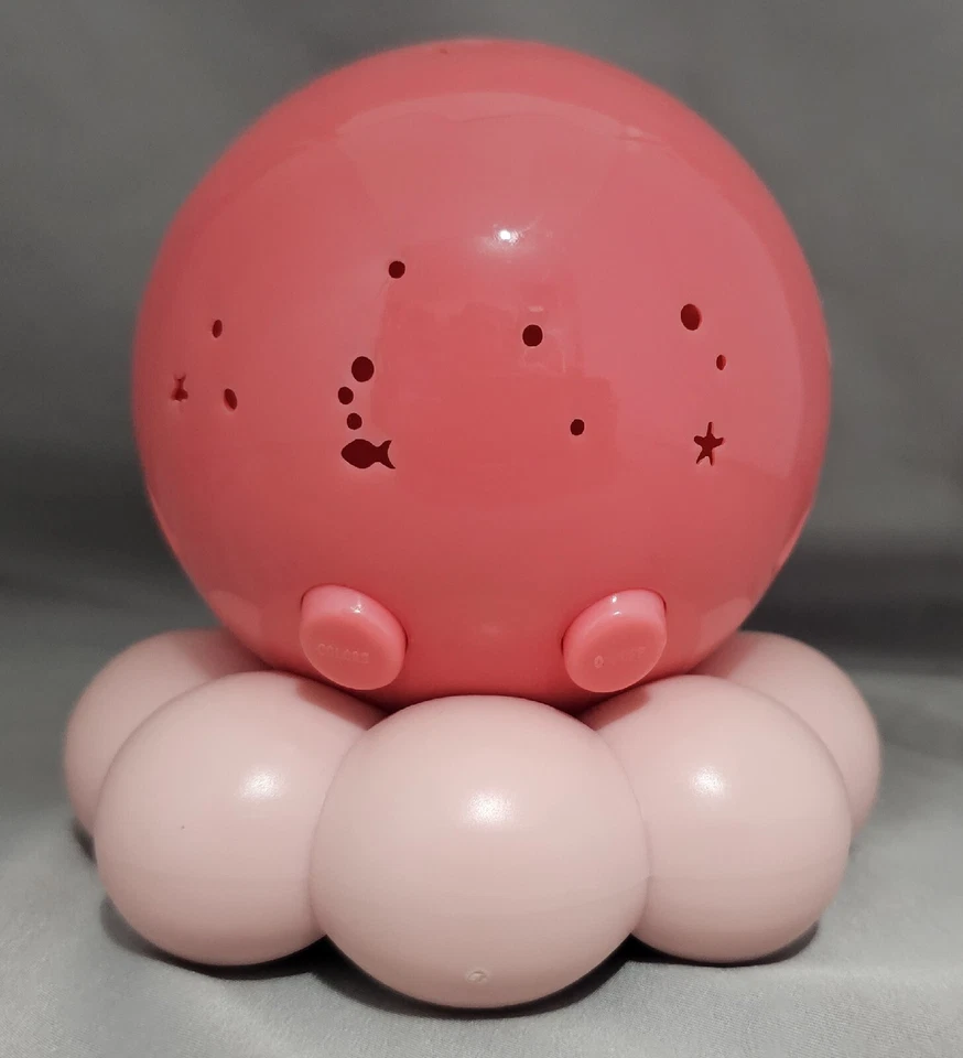 Proyector Cloud b Nightlight Twinkle To Go Octo Rosa Funciona Muy bien Foto 3 de 4