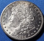 A 1884 CC Morgan Silver Dollar $1 Choice/Gem BU.
