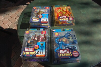 LOT of 4 MARVEL LEGENDS TOYBIZ HUMAN TORCH, PROFESSOR X, MR FANTASIC, SABRETOOTH