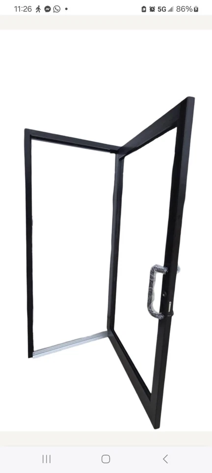 Puerta Storeront. Bronce oscuro. Puerta de entrada comercial de aluminio. Puerta de cristal. Foto 4 de 4