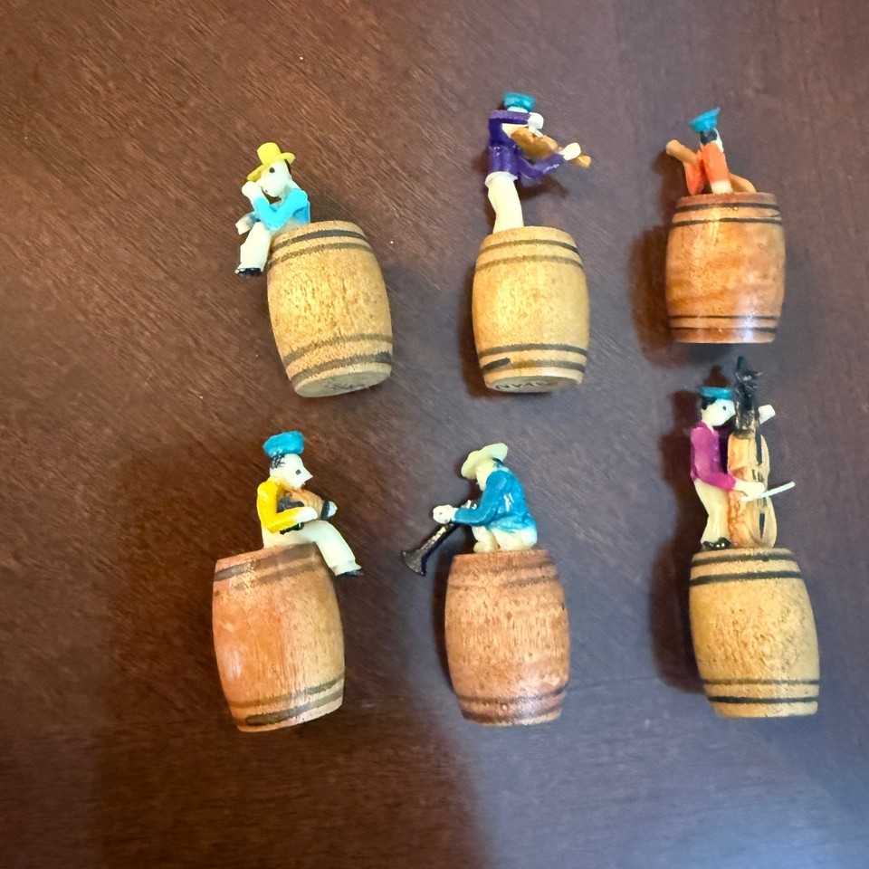 A complete set of 6 miniature Japan-made musician figurines on wooden barrels from the 60s — tiny, whimsical, and wildly charming as a shelf vignette.