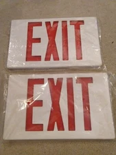 EXIT SIGNS - 2 new in packaging PLUS a bonus!