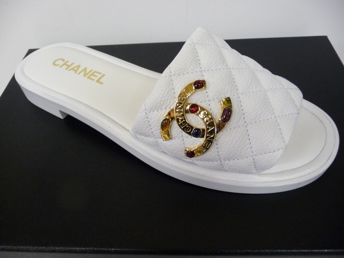 Chanel 22S G38794 White Shiny Leather Gold Logo Mules 38 EUR size