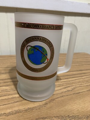 NRO logo Frosted Glass Mug Stein With image of the Earth and orbiting rings.