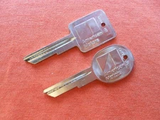 2 AMC AMERICAN MOTORS IGNITION AND TRUNK NOS KEY BLANKS W KNOCKOUTS 1970 - 1984